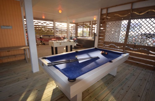 St. George Island House | Save 15% on fall stays! Steps to Beach, Gameroom, pool, hot tub, dog friendly.