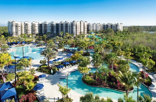 Four Corners Condo | Shuttle to Disney World| Condo with King & Queen!