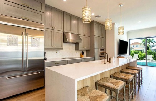 Naples Park House | Sorrento Luxury Vacation Home: Expansive 5-Bedroom, 4.5-Bath Retreat with Private Pool, Hot Tub and Pet-Friendly Accommodations. Just a Short Walk to the beach at Delnor-Wiggins State Park!