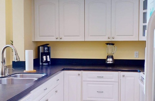 Madeira Beach Condo | Spacious beachfront comfortable 3-bedroom 2-bath. Heated pool. Great location for a FL vacation.