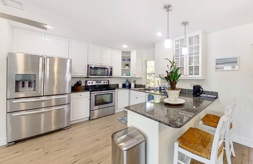 Central Naples House | Spacious & beautiful home with fast WiFi, central AC, patio, and W/D