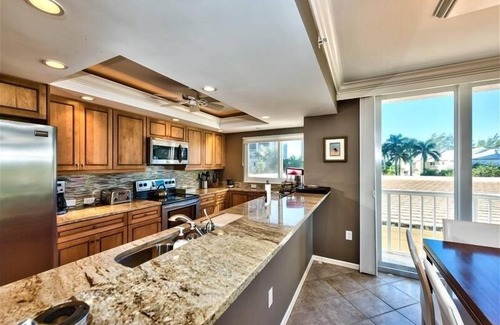 Park Shore Condo | Steps to the beach w/a beautiful pool view CL0101