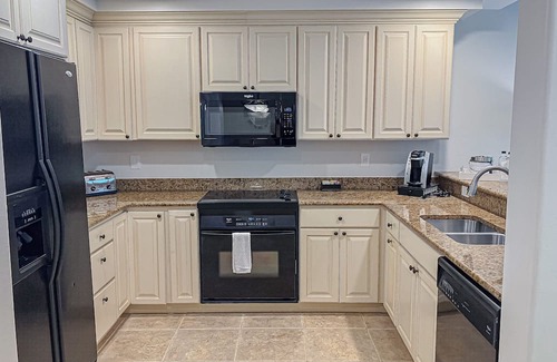 Redevelopment Area Condo | Style, comfort, and convenience-Just a short walk to the heated outdoor pool