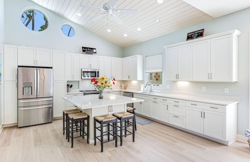Holmes Beach House | Surfside AMI; backyard oasis steps to beach, heated pool, putting green,+gear!