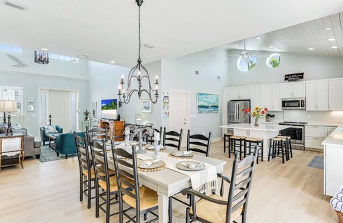 Holmes Beach House | Surfside AMI; backyard oasis steps to beach, heated pool, putting green,+gear!
