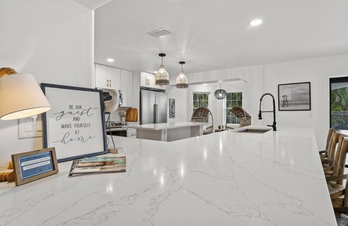 Biggar House | The Sunset Escape: Riverfront Elegance with Pool