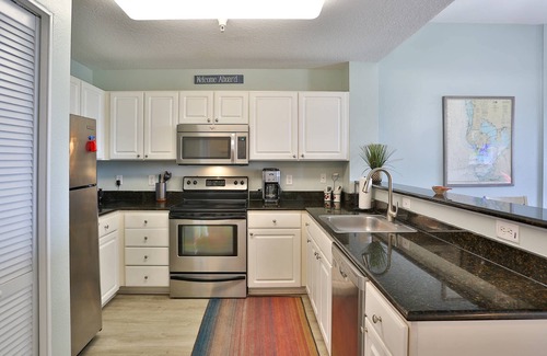 Madeira Beach Condo | Top Floor Overlooking the Marina. Close to Johns Pass. Spacious with Two Private Balconies!