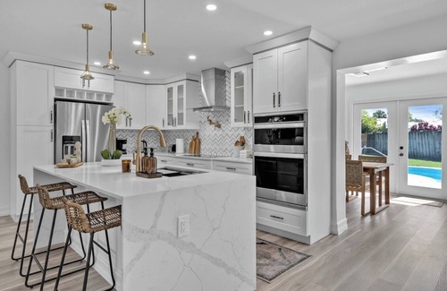Florida North Atlantic Coast House | Tres Palmas · Luxury 4BR Oasis: Pool, Hot Tub, Beach & Golf!