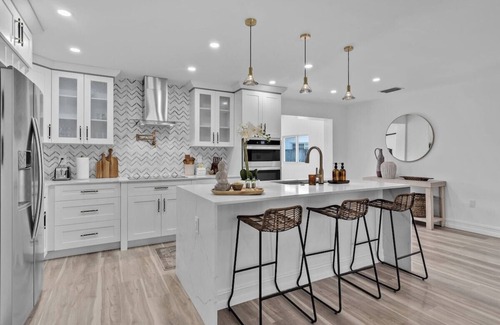 Florida North Atlantic Coast House | Tres Palmas · Luxury 4BR Oasis: Pool, Hot Tub, Beach & Golf!