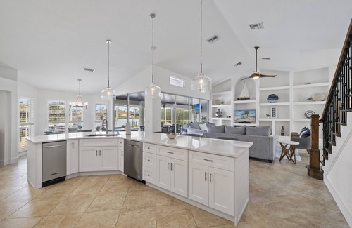 Pelican House | Unbeatable Direct Gulf Access Heated Pool Home with a Hot Tub and 6 bedrooms!