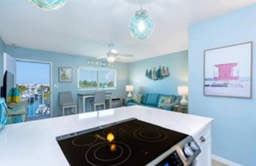 Marathon Apartment | Updated WATERFRONT, pool, tiki bar, boat ramp, etc