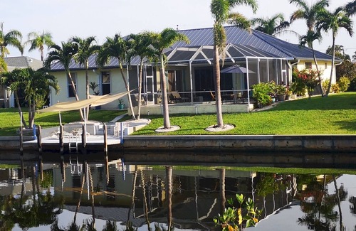 Pelican Villa | VILLA 'THE ARTIST' GULF ACCESS HOME, SOLAR-AND ELECTRIC HEATED POOL