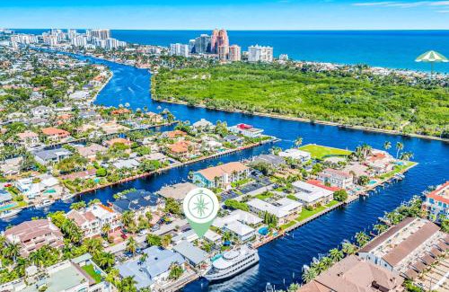 Coral Ridge Villa | Waterfront Compound 2 Heated Pools SaltAire Lime Keys