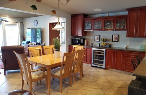 Indian Rocks Beach House | Waterfront Luxury Oasis - Steps to Beach n - Kayaks, Private Dock & Patio 🏖