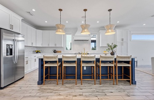 Bradenton Beach House | Waterfront Luxury Home with Pool and Spa, Golf Cart, and beach Bikes included!