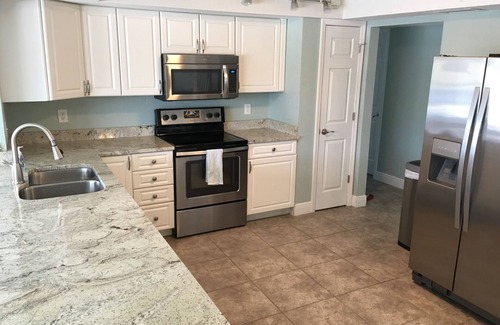 Oakland Hills House | YOUR HAPPY PLACE IN THE SUN! Newly Renovated Pool Home Near Beaches & Golf.