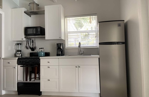 East Fort Lauderdale House | 1 Bedroom Suite in a duplex house- private heated pool for you- walk to beach