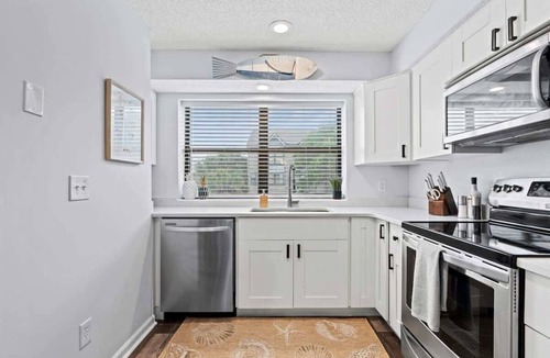 Jacksonville Beach House | 1 Block to Beach: Palm Paradise, A Coastal Oasis