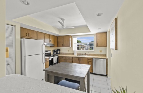 Palm Beach Shores Apartment | 1 Block to the BEACH! HOT TUB! King Beds! Spacious