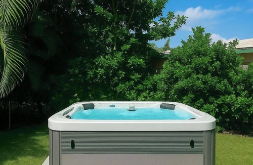 Palm Beach Shores Apartment | 1 Block to the BEACH! HOT TUB! King Beds! Spacious