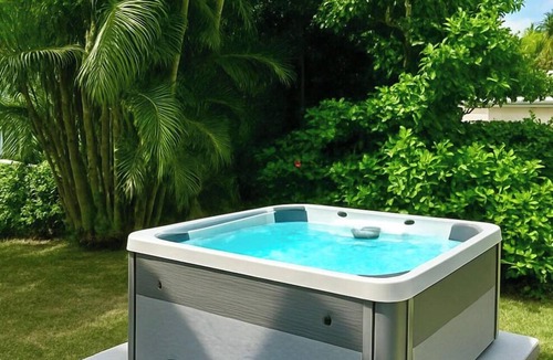 Palm Beach Shores Apartment | 1 Block to the BEACH! HOT TUB! King Beds! Spacious