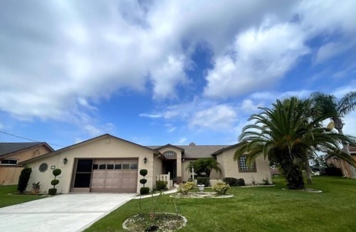 Palm Harbor House | 10 min from beach access, sleeps 10 private dock