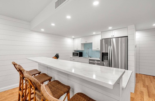 West Beach Village Condo | 1351 Fairway Oaks Villa by Akers Ellis Rentals