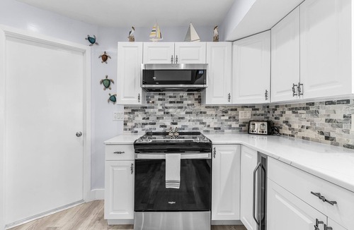 Saint James City House | 2/2 Pool Home on the Water, Boat Lift Included!