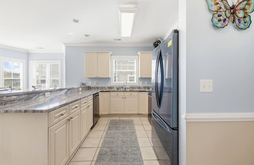 Central Myrtle Beach Apartment | 2 King Beds, Pond View, Golf Resort Condo Near Beach