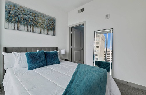 North Buckhead Apartment | 2 minutes walk to lenox! Stylish high rise w/ fireplace!