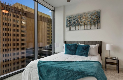 North Buckhead Apartment | 2 minutes walk to lenox! Stylish high rise w/ fireplace!