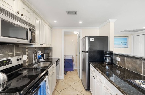 West Beach Village Condo | 2269 Shipwatch Villa by Akers Ellis Rentals