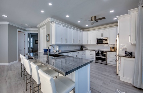 Mid Island House | 251 Key West Court: HUGE Luxe Beachfront Pool Home Steps from the Sand