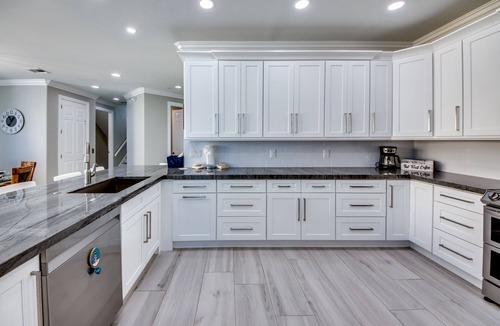 Mid Island House | 251 Key West Court: HUGE Luxe Beachfront Pool Home Steps from the Sand