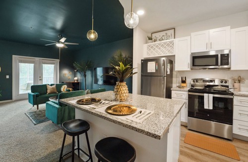 Yulee Apartment | 2BR with Private Screened Balcony, Pool, Gym & Cornhole: Resort Style Experience
