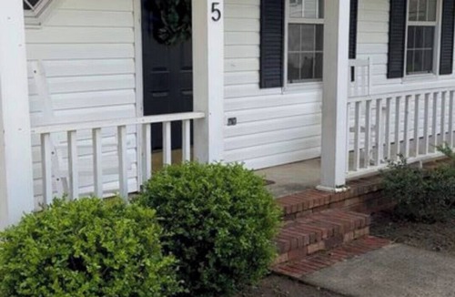 Martinez House | 3-bedroom house with back patio and screened in porch.