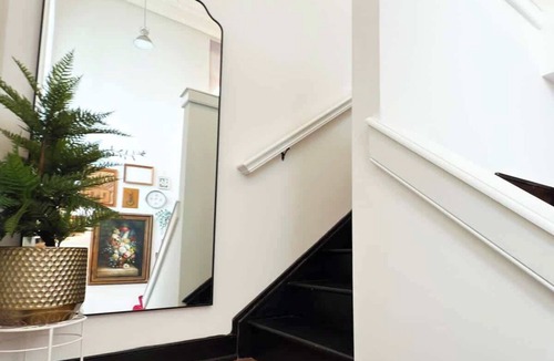 Olde Kensington Apartment | 30 Ft Ceiling | Church Loft | Balcony | King Bed