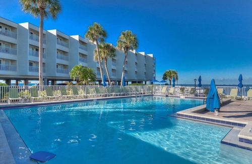 Rocky Point Apartment | 311 · Sophisticated Waterfront Getaway: Pool, Balcony, and Serene Views