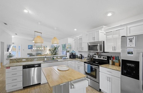 Palm Coast House | 3BR Coastal Home + Heated Pool, Golf Cart & Bikes