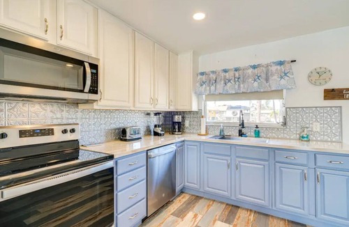 Matlacha House | 3BR Waterfront townhome Matlacha with hot tub, boat dock WiFi, bikes and kayaks