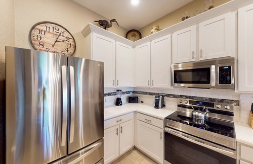 Bahama Bay Condo | 3rd floor condo w/sauna, tennis court, shared pools, gym, balcony