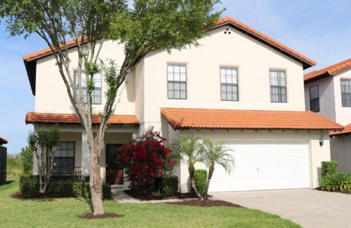 Four Corners Condo | 4 bedroom 3 bathroom pool home with water view at small gated community of High Grove Resort