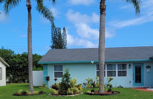Riviera Beach House | 4-bedroom house in charming Riviera Beach with WiFi, AC. Relax and unwind