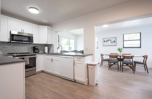 Redevelopment Area House | 🏖️4 BR Canal Front Oasis- 1.5 Miles to Downtown!