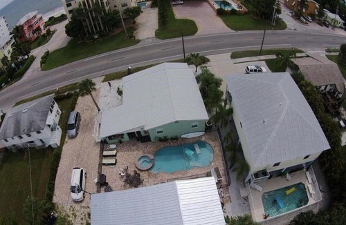 Mid Island House | 4431 Estero Blvd by Coastal Vacation Properties