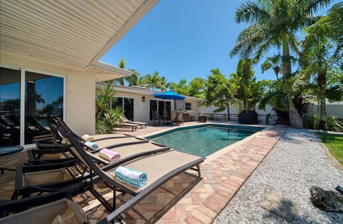 Indian Rocks Beach House | 456 Waterfront w/Dock, 3/Br Home Heated pool with Golf Cart in IRB Sleeps 10