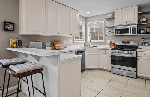 Smyrna House | 4BD Creekside Getaway - 2KG Beds, Sunporch, Firepit & Furnished Comfort!