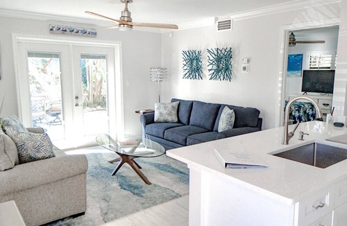Old Naples Condo | 5-8 MINUTE WALK TO BEACHES, DINING & SHOPPING! RARE PRIVATE PATIO & LAKE VIEW!