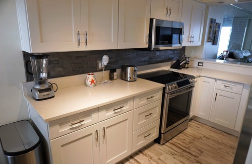 Seawinds Condo Condo | 5 STAR Direct Oceanfront Condo-ALL proceeds benefit physically handicapped child