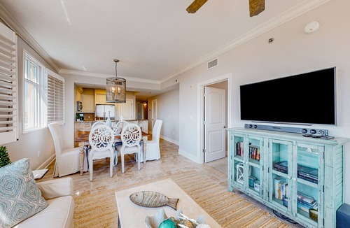 Fort Walton Beach Condo | 5th-floor condo with hot tub, outdoor pool, gym, partial ocean views, balcony